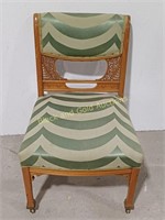 Intricate Carved Back Cushioned Chair