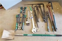 Large group of bolt cutters, large wrenches, crow