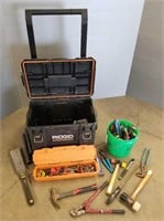 Rigid tool box with tools