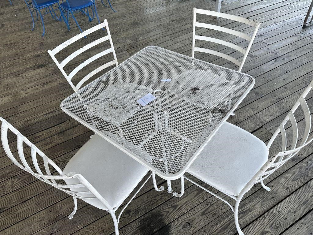 Wrought Iron table with 4 padded chairs