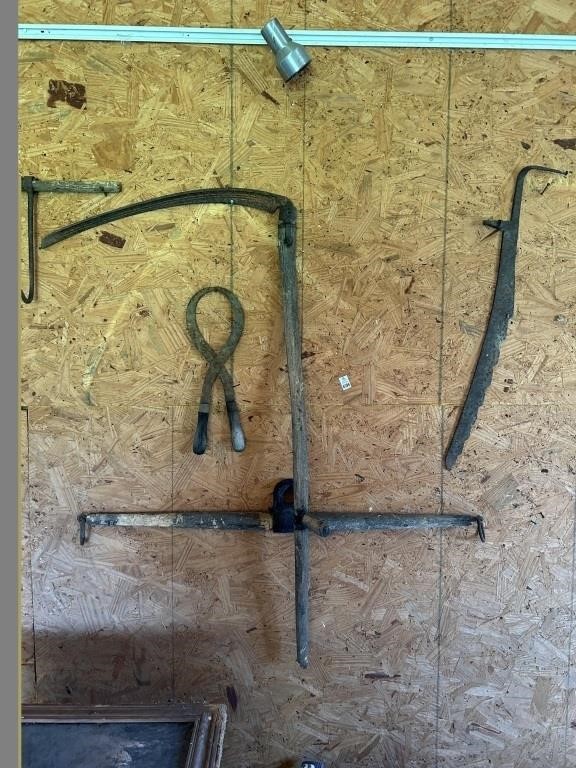 Antique Primitive Tools On Wall