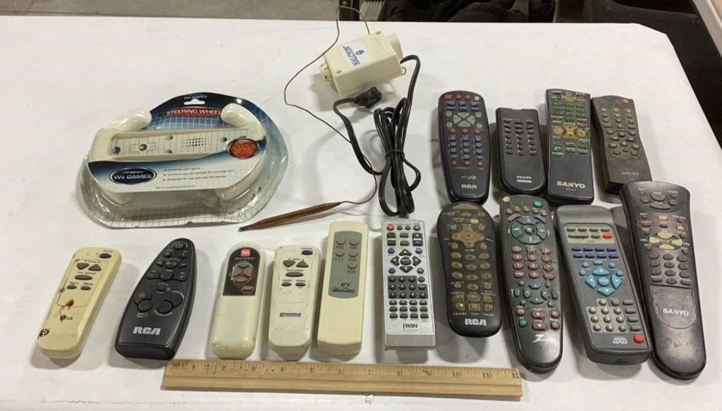 Lot of remotes & WII Games steering wheel