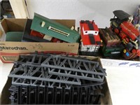 4 plastic train cars, track, and station