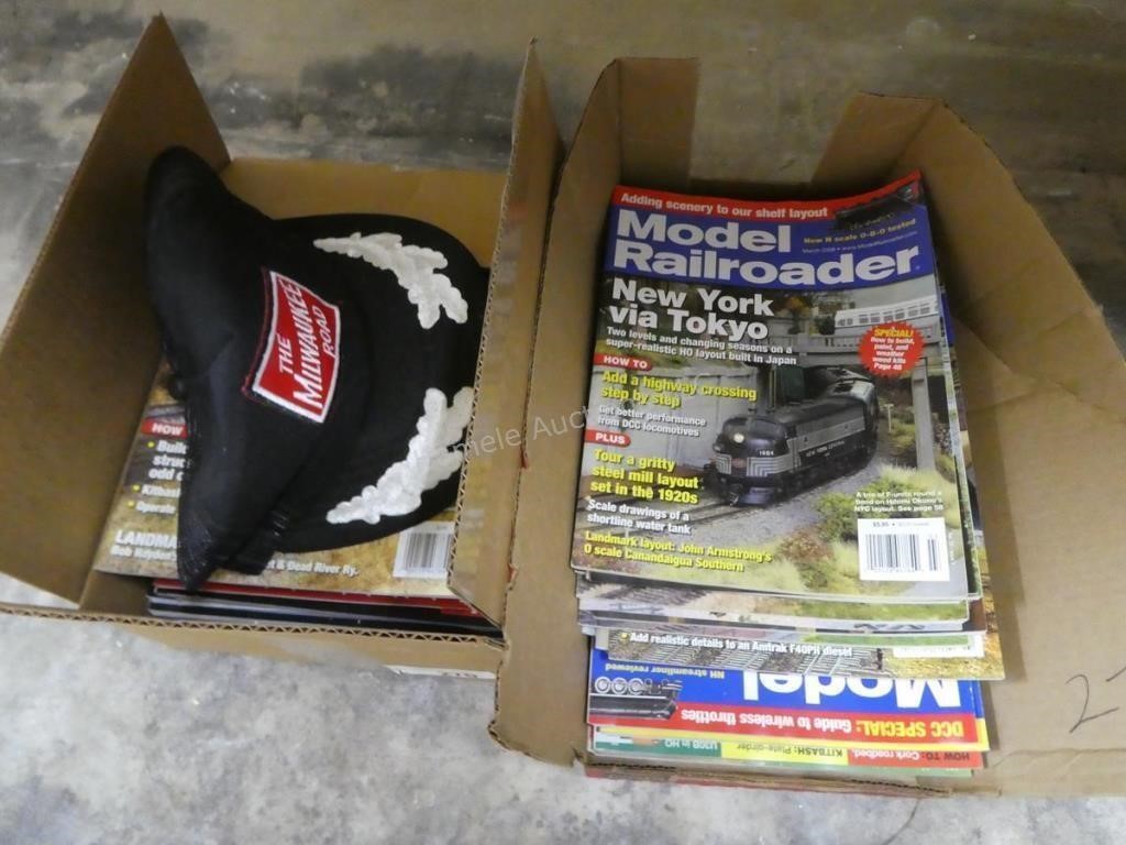 2 boxes Model Railroader magazines and hat