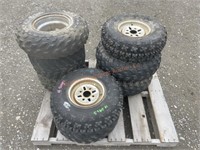 Pallet misc 4 wheeler tires with rims