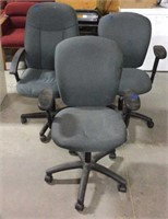 3 gray office chairs