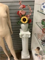 Plaster pedestal with decorative vase and faux