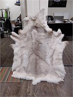 Fur hide with shaved artwork