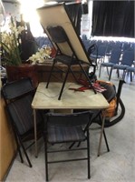 Folding table with four chairs