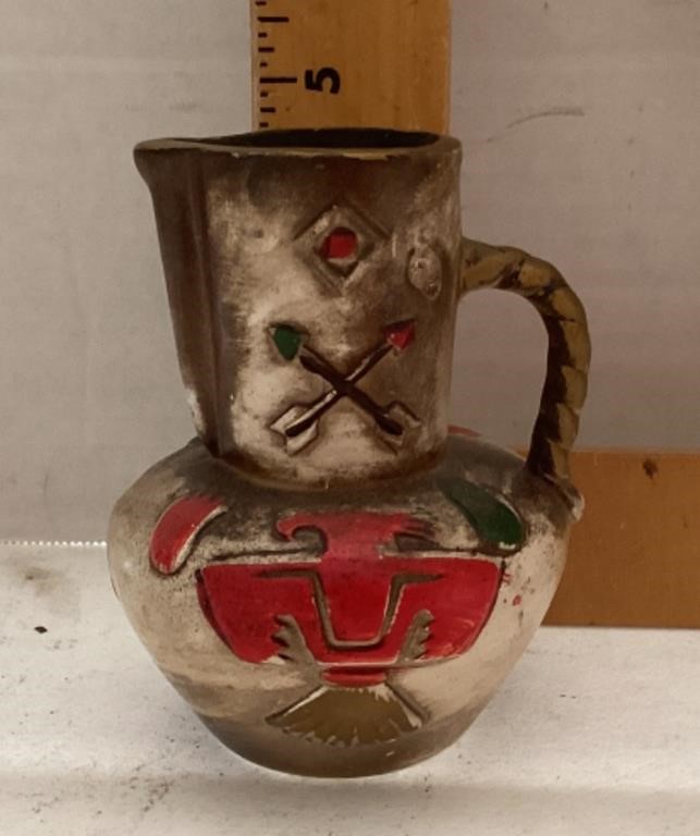 Native American design pottery pitcher