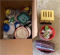 Box of toys and play dishes