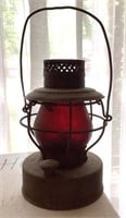 Handlan kerosene lantern with red globe