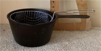 Cast iron pot with fryer basket