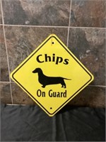 Metal dog sign