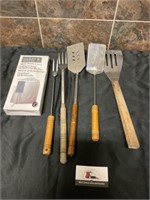 Weber kettle cover and grilling utensils