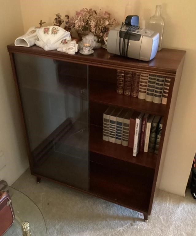 48" Bookcase with sliding glass doors and contents