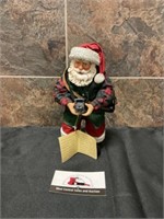 Santa with camer figurine