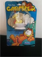 Vintage Garfield toilet bowlin Odie toy