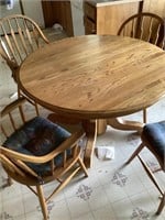 48" Round oak pedestal table and 4 chairs