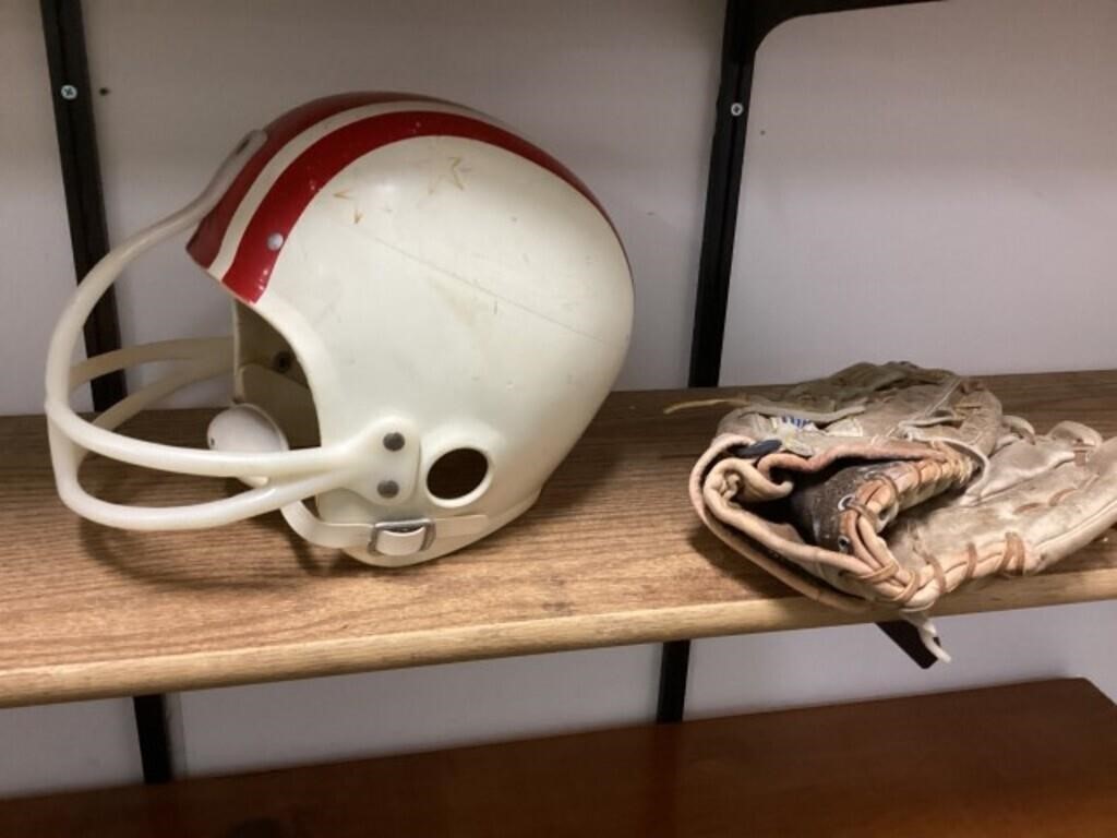 Baseball glove and football helmet