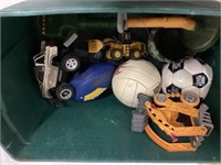 Toy trucks and balls