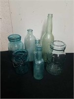 Green and blue vintage jars and bottles