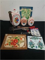 Vintage canisters, utensils, and decals the