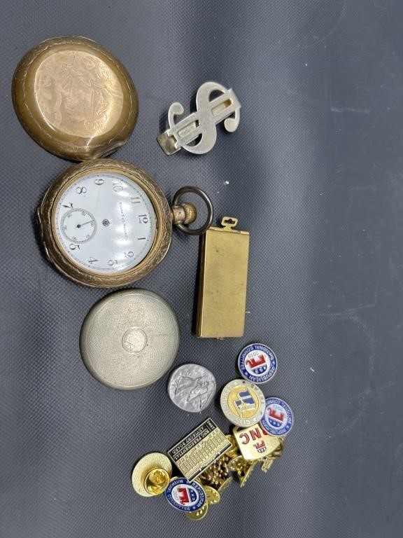 Money clip, pocket watch and pins