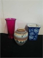 8 inch planter, 7 in Navajo pottery vase, and a
