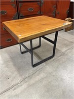 Live edge would coffee table with metal base. 28