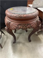 Antique fancy carved round table with serpent