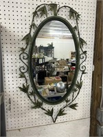 New in the box oval mirror with metal frame and