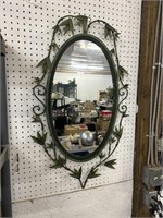 New in the box oval mirror with metal frame and