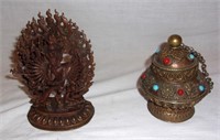 Goddess statue & Tibetan treasure vase.