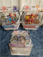Three new Bakugan figurines with trading cards