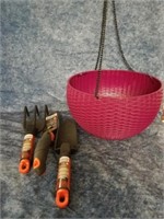 New hanging planter pot with new gardening tools