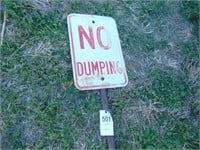 NO DUMPING METAL SIGN ON POST