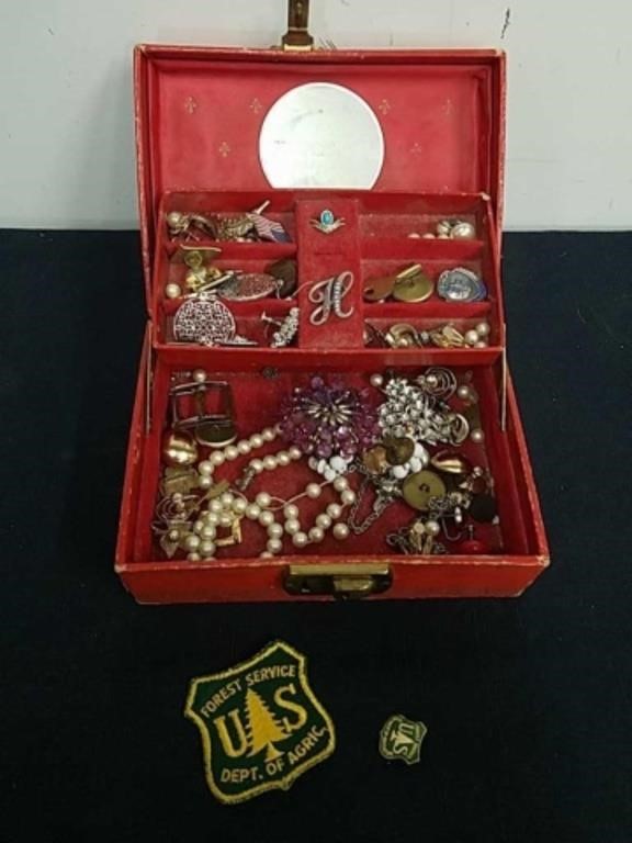 Small vintage jewelry box with vintage items
