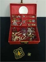 Small vintage jewelry box with vintage items