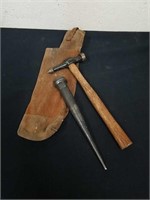 A Klein punch, some type of hammer and a Leather