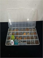 Divided plastic container with miscellaneous gold