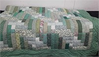 Approximately 84 x 112 in handmade quilt