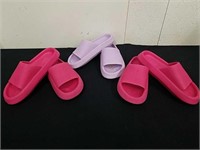 Three pairs of size 9 slip-on sandals