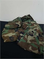 Five pairs of size medium military pants