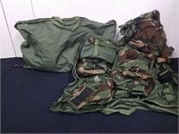 2 military vests with all the little pouches