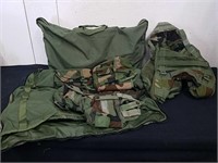 Two military vests with pouches