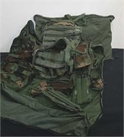 Two military vests with pouches and carrying bags