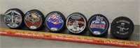 AHL hockey pucks lot, see pics
