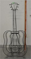 Wire metal guitar shaped CDs stand