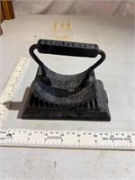 Cast iron crimping rocking iron